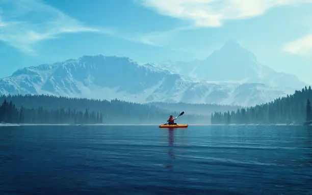 Photo of Man with canoe on the lake.