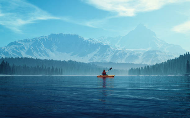 man with canoe on the lake. - canoagem imagens e fotografias de stock