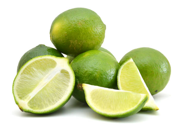 istock Fresh ripe lime isolated on white background 988644382