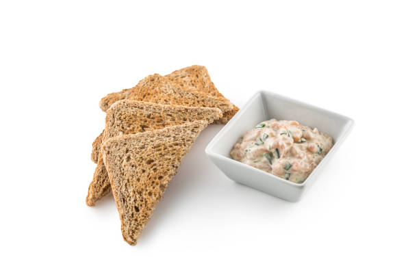 salmon creamy tartar with toasts isolated on white - creme fraiche imagens e fotografias de stock