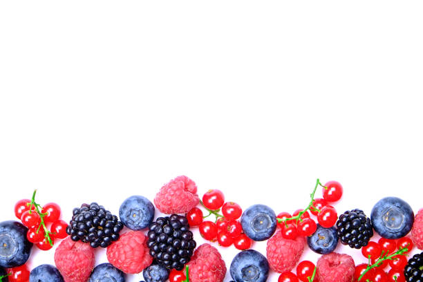 bunch of mixed berries in harvest pile on white background. colorful composition with fresh organic strawberry, blueberry, blackberry & redcurrant. clean eating concept. close up, copy space, top view - blackberry currant strawberry antioxidant imagens e fotografias de stock