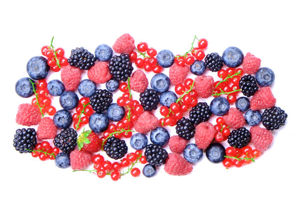 bunch of mixed berries in harvest pile on white background. colorful composition with fresh organic strawberry, blueberry, blackberry & redcurrant. clean eating concept. close up, copy space, top view - blackberry currant strawberry antioxidant imagens e fotografias de stock