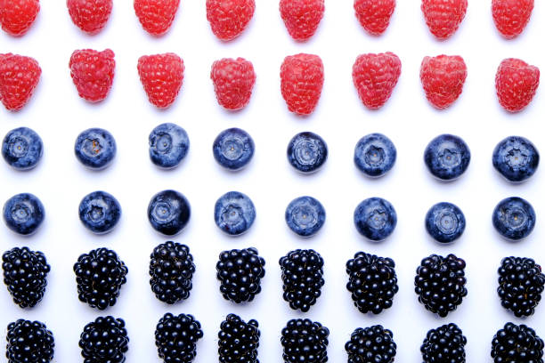 istock Fresh organic mixed berries: blueberry, raspberry & blackberry in seamless pattern, white background. Clean eating concept. Healthy vegan snack, raw food diet. Close up, copy space, top view, flat lay 988664734