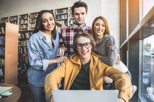 istock Satisfied students having job with appliance 988669564