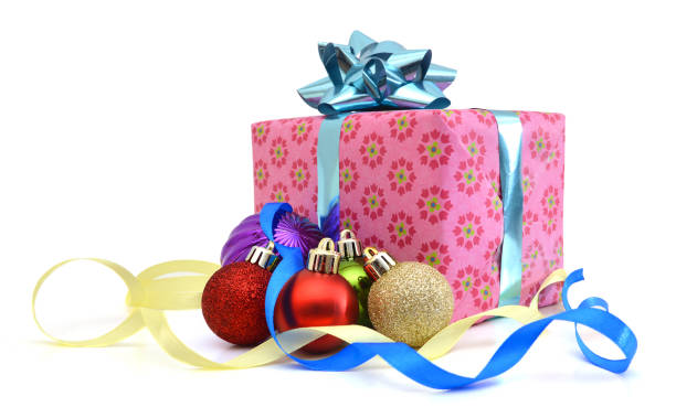 istock Gift box and christmas balls,Isolated on white. 988677166