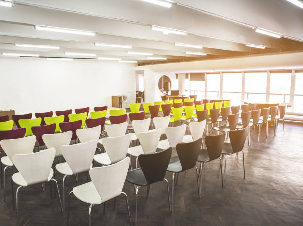 istock Lines of seats in modern auditorium 988677322