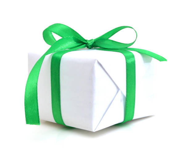 istock White gift box with green  ribbon bow, isolated on white 988686052