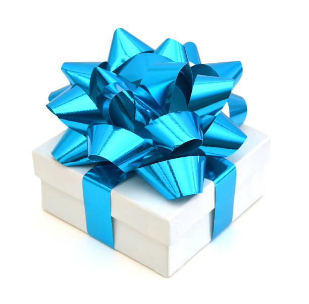 istock Gift box with ribbon and blue bow isolated on the white background, clipping path included. 988690562