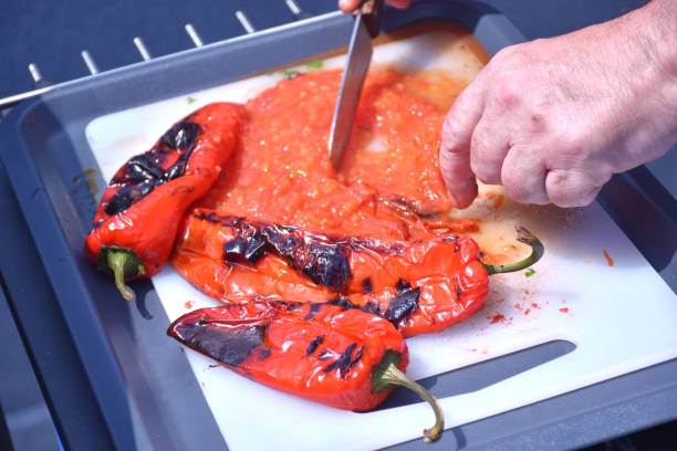 istock Roast capsicum. Red Peppers on the Grill 988696472