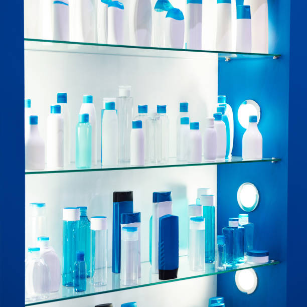 istock Showcase shop with plastic bottles shampoo 988725534