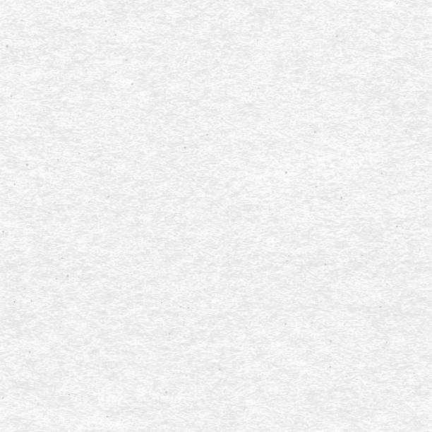 istock White craft paper with speckle seamless vector texture. Close-up of gray cardboard or parchment background. 988730010