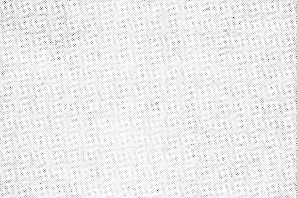 Subtle halftone dots vector texture overlay Subtle halftone vector texture overlay. Monochrome abstract splattered background. distressed stock illustrations