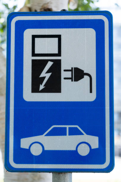 istock Parking sign with charging station 988734194