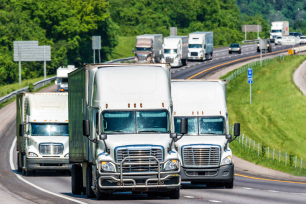 istock Heavy Truck Traffic on an Interstate Highway 988737328