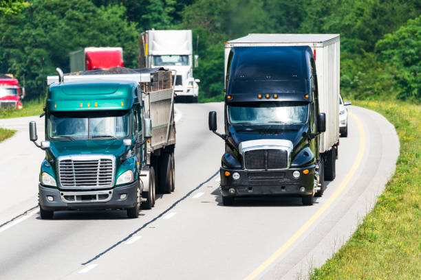istock Heavy Truck Traffic on Interstate Highway 988737334