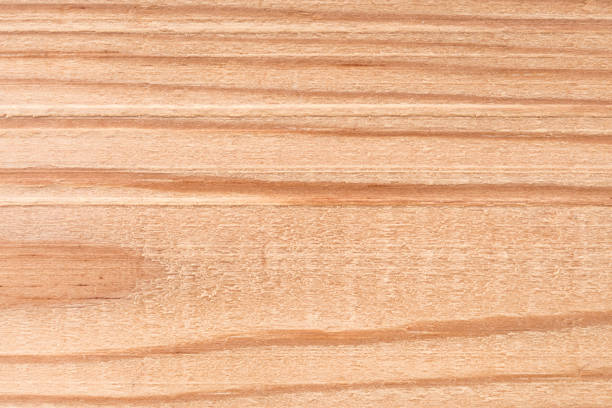 istock texture of a natural wooden panel rough processing, abstract background 988755676