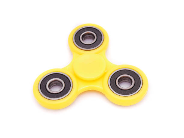 istock Spinning fidget isolated on white background in studio shot 988772886