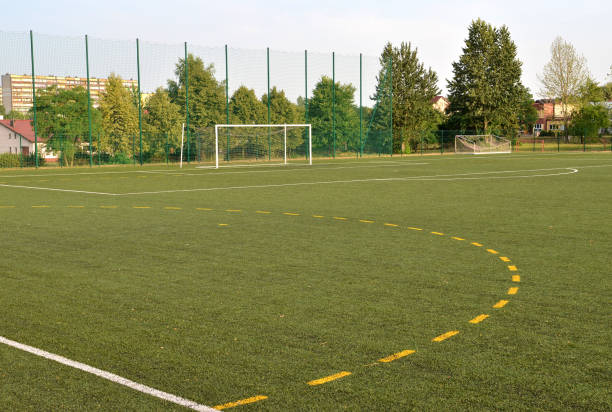 istock A view of a net on a vacant soccer pitch. 988788716