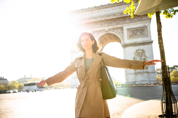 istock happiness woman in paris 988802198