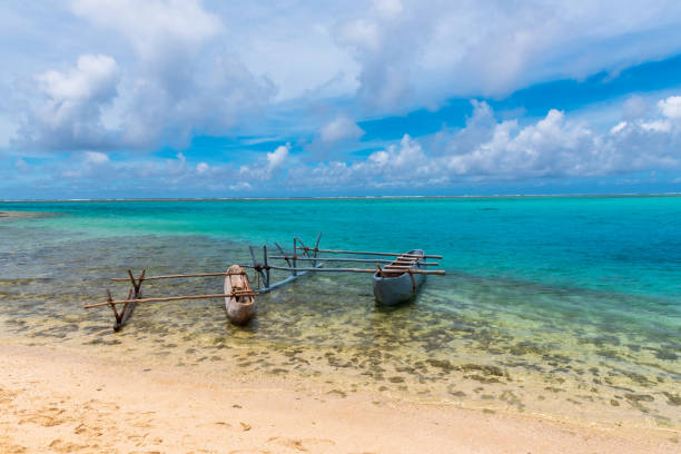 istock Two Outrigger Canoes on a Fiji Beach 988819074