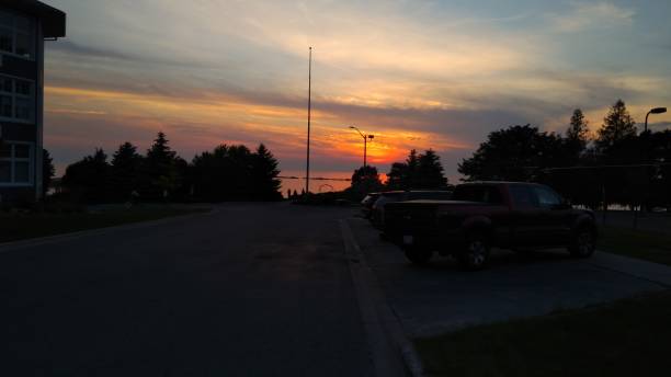 istock sunset on the street 988921140