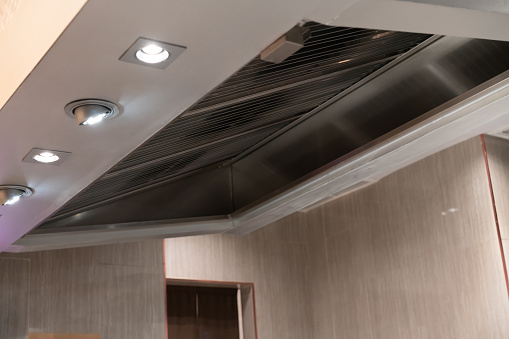 Stainless exhaust hood and ventilation for teppanyaki kitchen restaurant.