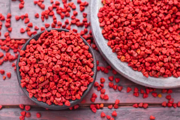 Seeds of achiote, originating from central america and parts of south america is used to season food