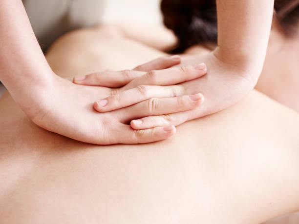 istock close-up of hands of massuese showing massage techniques 988943222