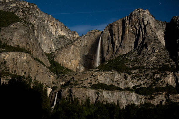 istock Yosemite Falls illuminated by the full moon at night 988961374