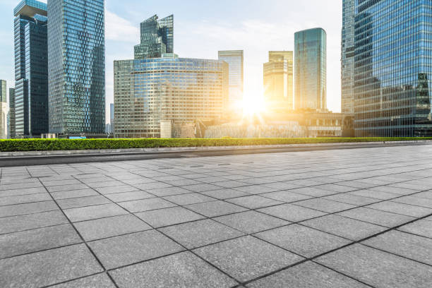 istock Empty pavement and the shanghai financial district 988962764