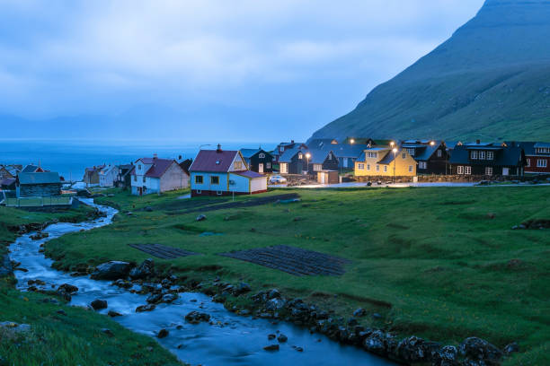 Gjogv Village on Esturoy Island at Night night view of Gjogv village on Faroe Islands eysturoy stock pictures, royalty-free photos & images