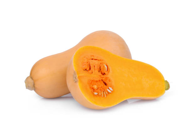 whole and half butternut squash isolated on white background