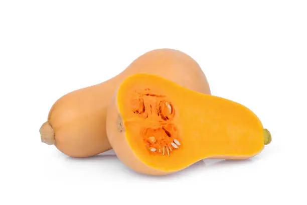 Photo of whole and half butternut squash isolated on white background