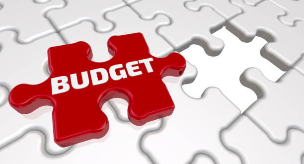 istock Budget. The inscription on the missing element of the puzzle 988995046