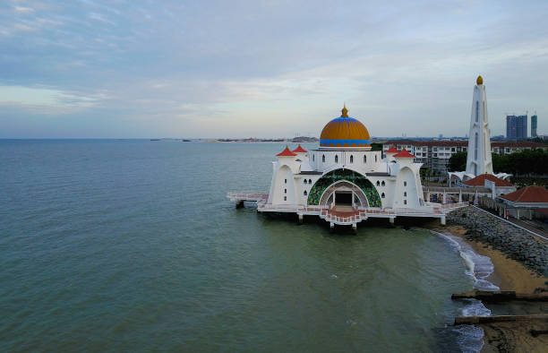 istock Majestic view of Malacca Straits Mosque during sunset 989009910