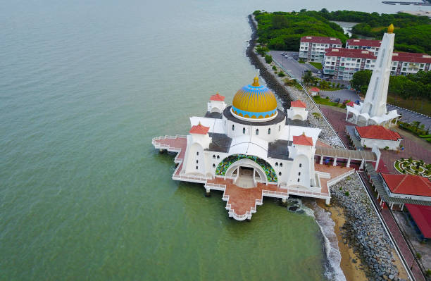 istock Majestic view of Malacca Straits Mosque during sunset 989051274