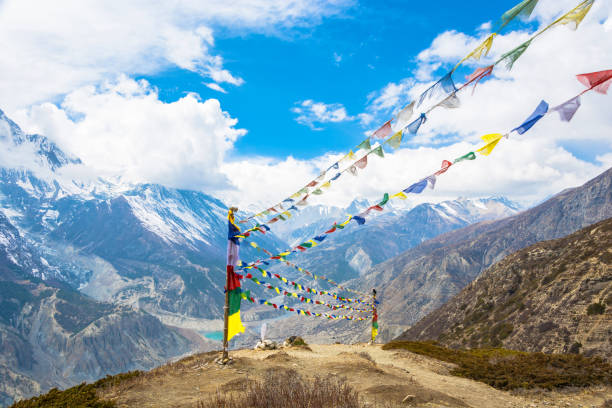 istock Rows of colored flags over the Himalayas, Nepal. 989074232