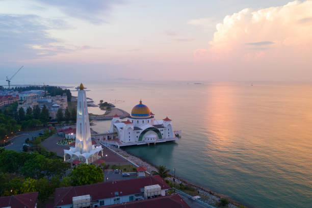 istock Arial view of Majestic Malacca Straits Mosque during sunset. 989107936
