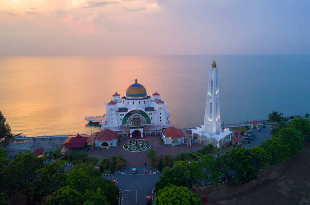 istock Arial view of Majestic Malacca Straits Mosque during sunset. 989109240