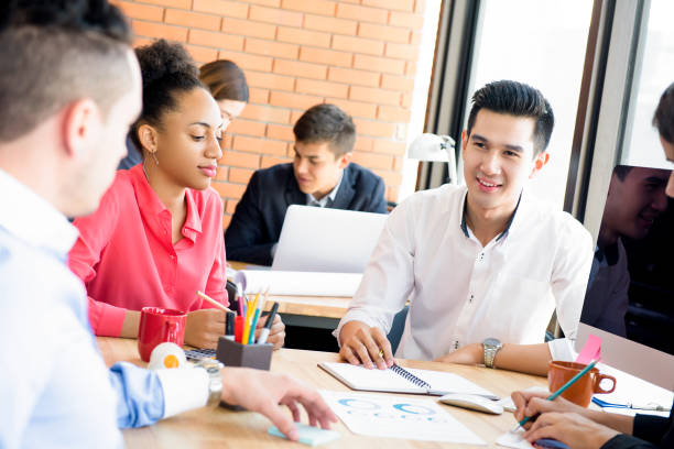 istock Multiethnic business team in the meeting 989111396