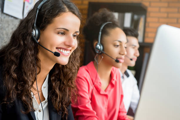 istock International call center team working in the office 989112406
