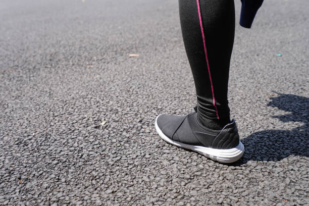 istock Woman sports outside 989126330