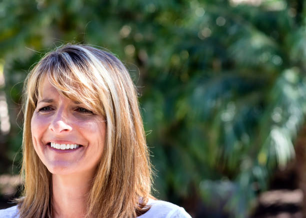 istock Big smile beautiful woman 989146300