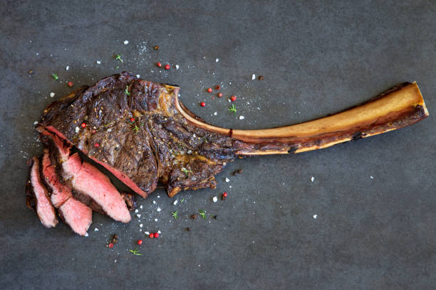 pyszny stek tomahawk - steak ribeye beef grilled zdjęcia i obrazy z banku zdjęć