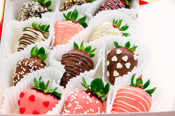 istock Strawberries in chocolate. Sweets for a gift. 989180200