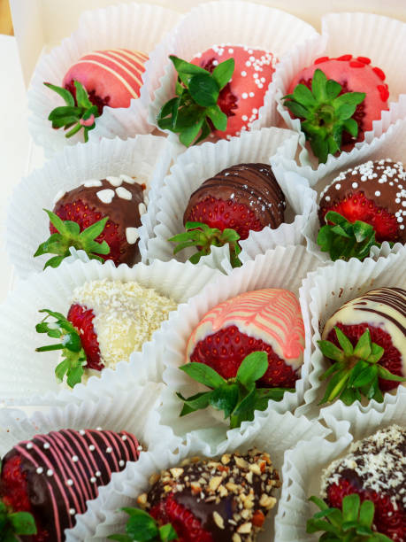 istock Strawberries in chocolate. Sweets for a gift. 989180798