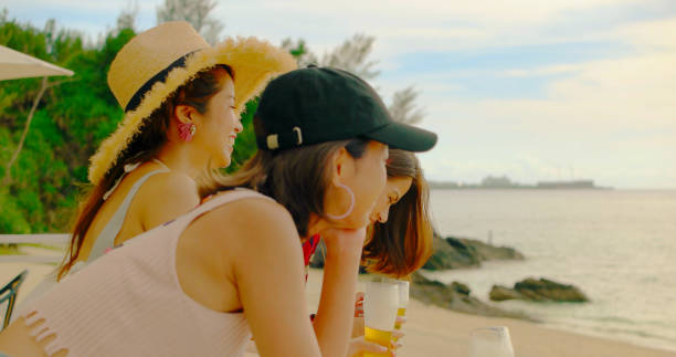 istock Young people having fun on the beach. 989186154