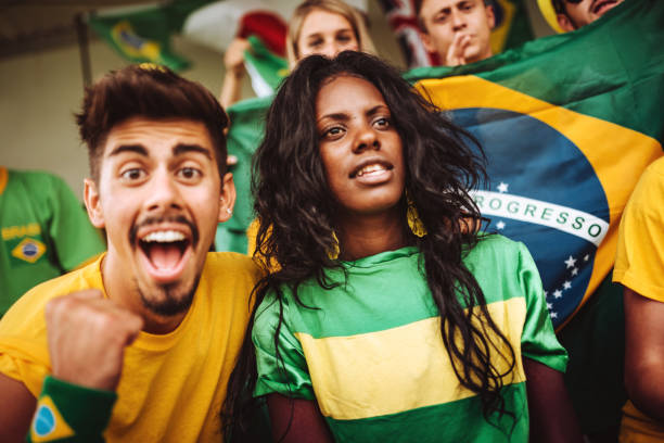 istock brazilian supporters have fun at the stadium 989192794