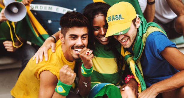 istock brazilian supporters have fun at the stadium 989193566