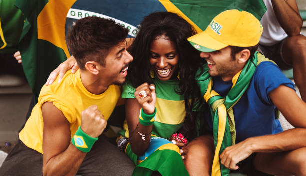 istock brazilian supporters have fun at the stadium 989193990